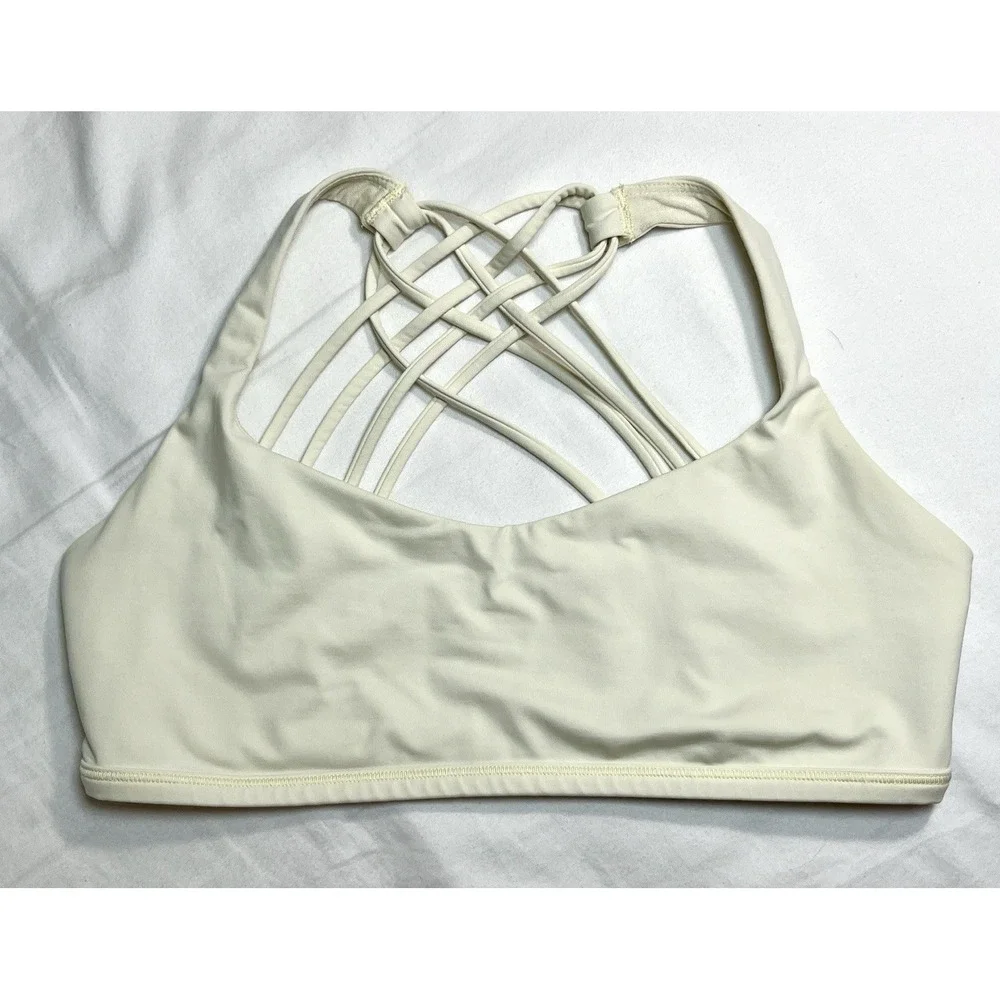 Lululemon Free To Be Wild Sports Bra Size 10 Ivory Criss Cross Strappy Yoga Gym - Picture 2 of 7